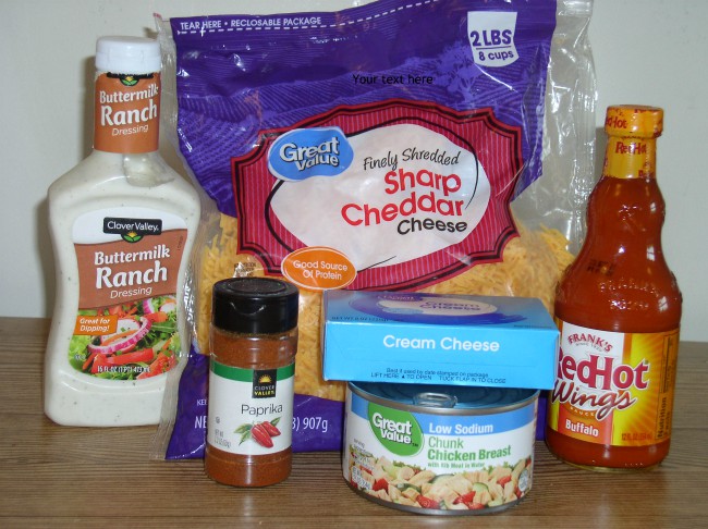 Buffalo Chicken dip, Chicken breast, Ranch dressing, Hot Wing sauce, Cream Cheese, and Shredded Cheese